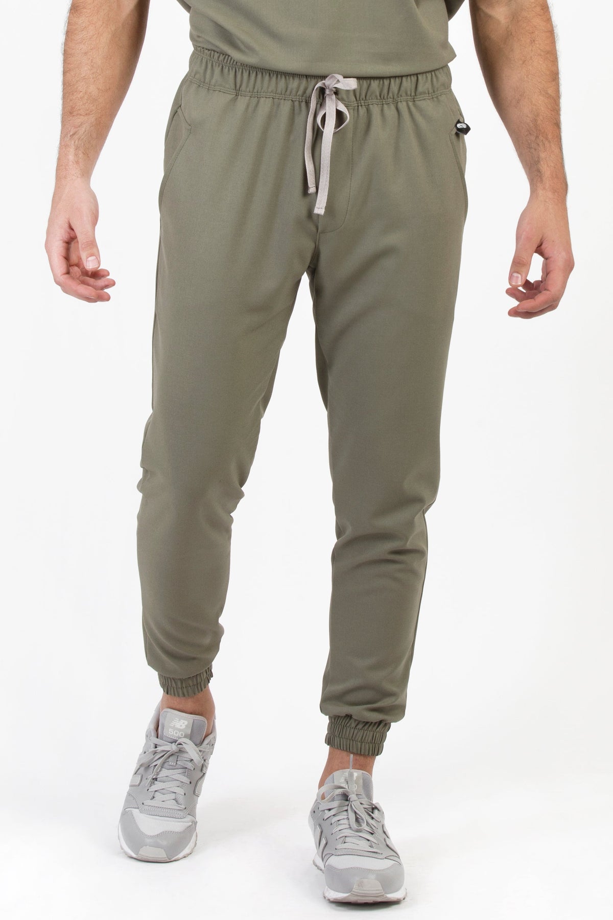 Man wearing Fresh Olive Scrub Pants by Work & Chill
