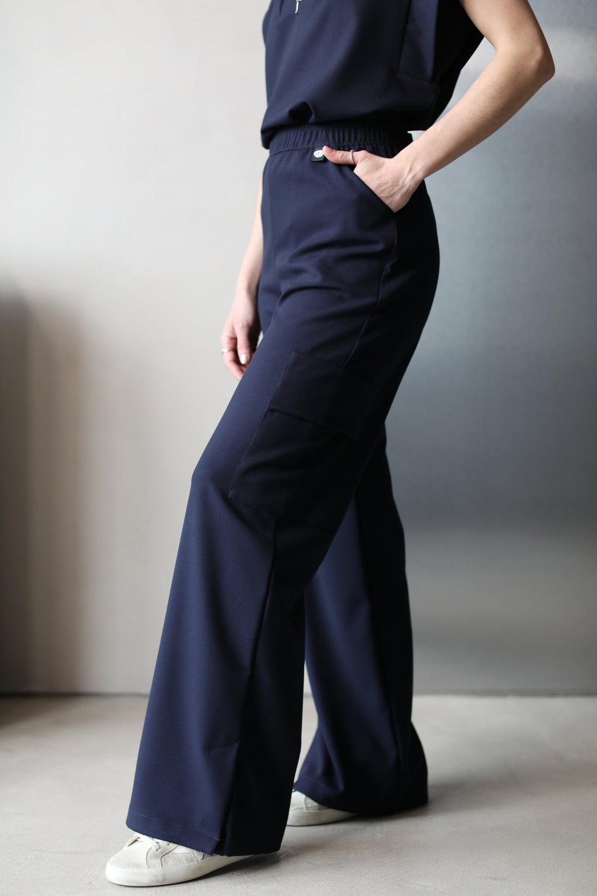 Side view of Kate Navy Scrub Pants by Work & Chill