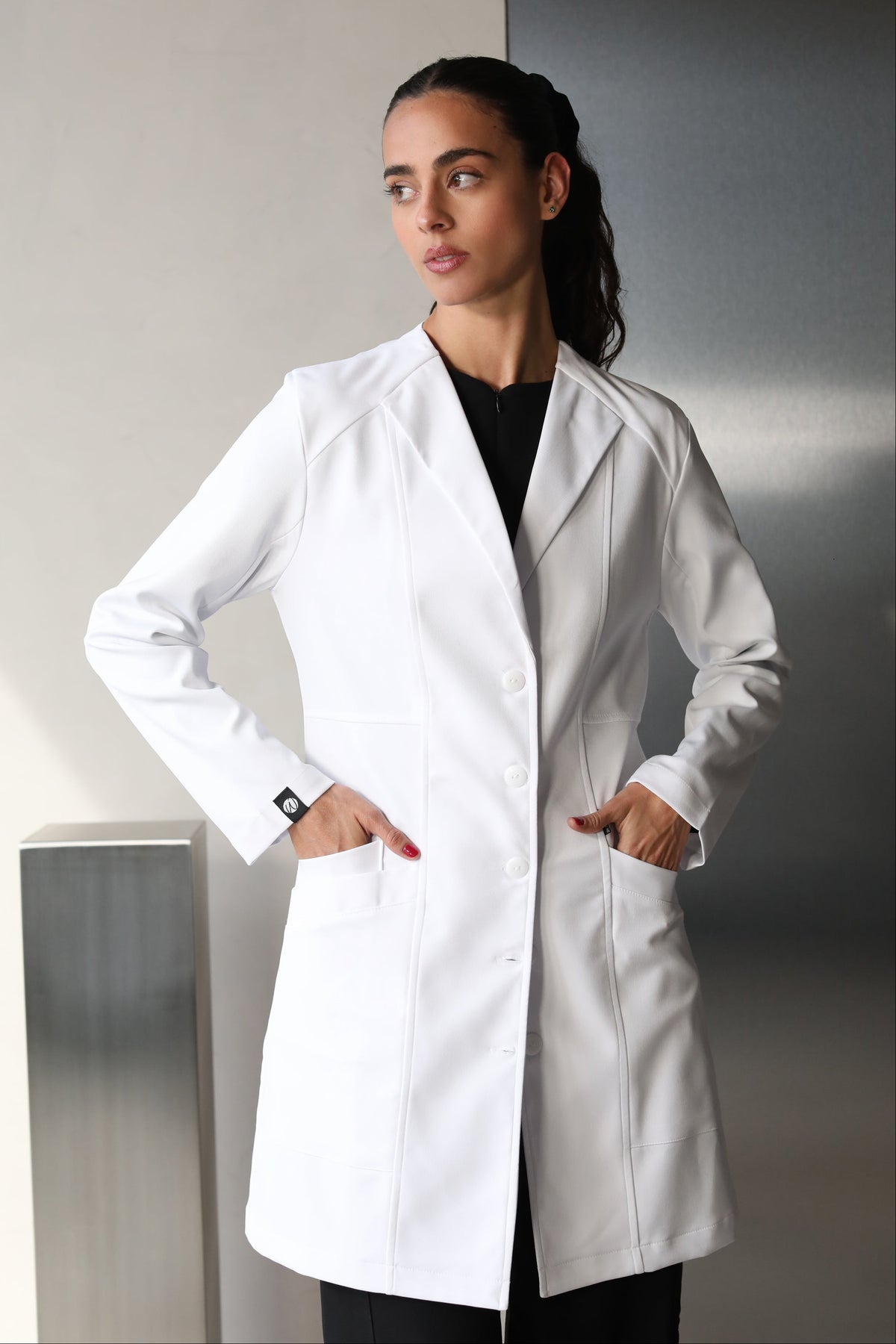 Model wearing Women’s Medic Coat in White – Work & Chill