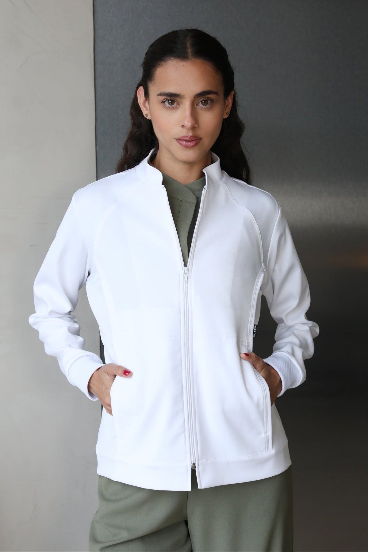 Woman wearing Women’s White Medic Coat by Work & Chill
