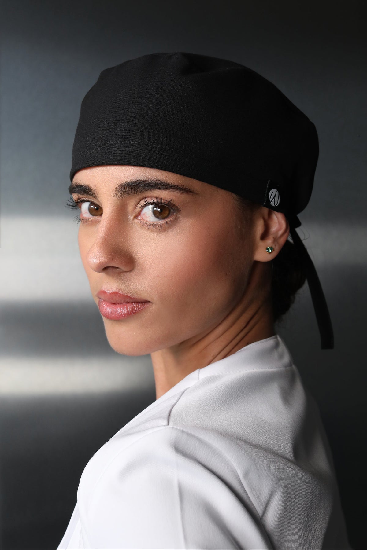 Woman wearing Black Women’s Surgical Cap by Work & Chill