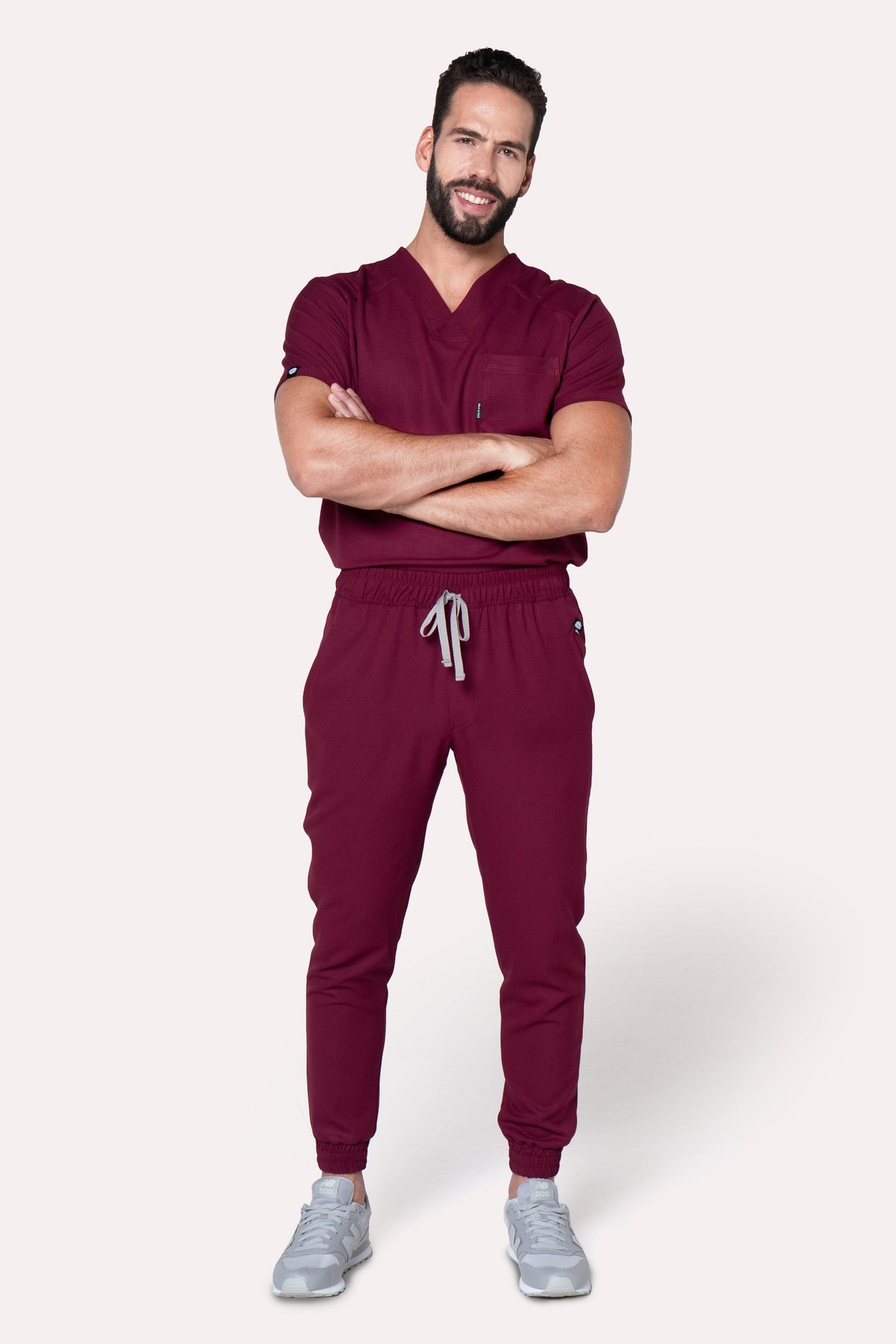 Model wearing Fresh Burgundy Scrub Pants with matching Fresh Scrub Top