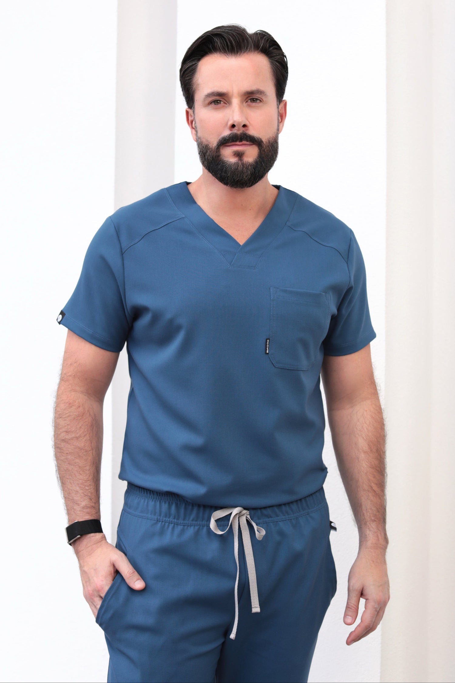 Man wearing Fresh Indigo Scrub Top by Work & Chill