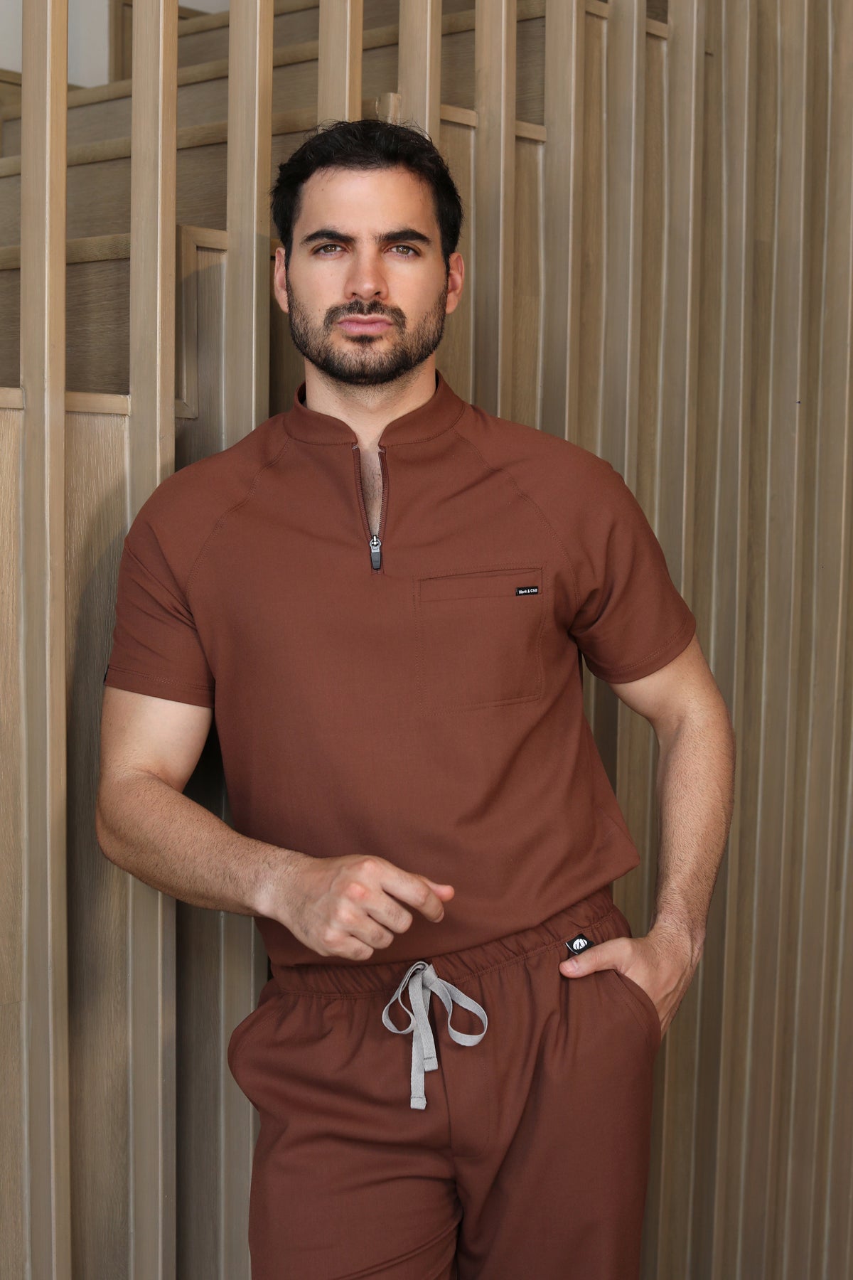 Man wearing Harry Cocoa Scrub Top by Work & Chill