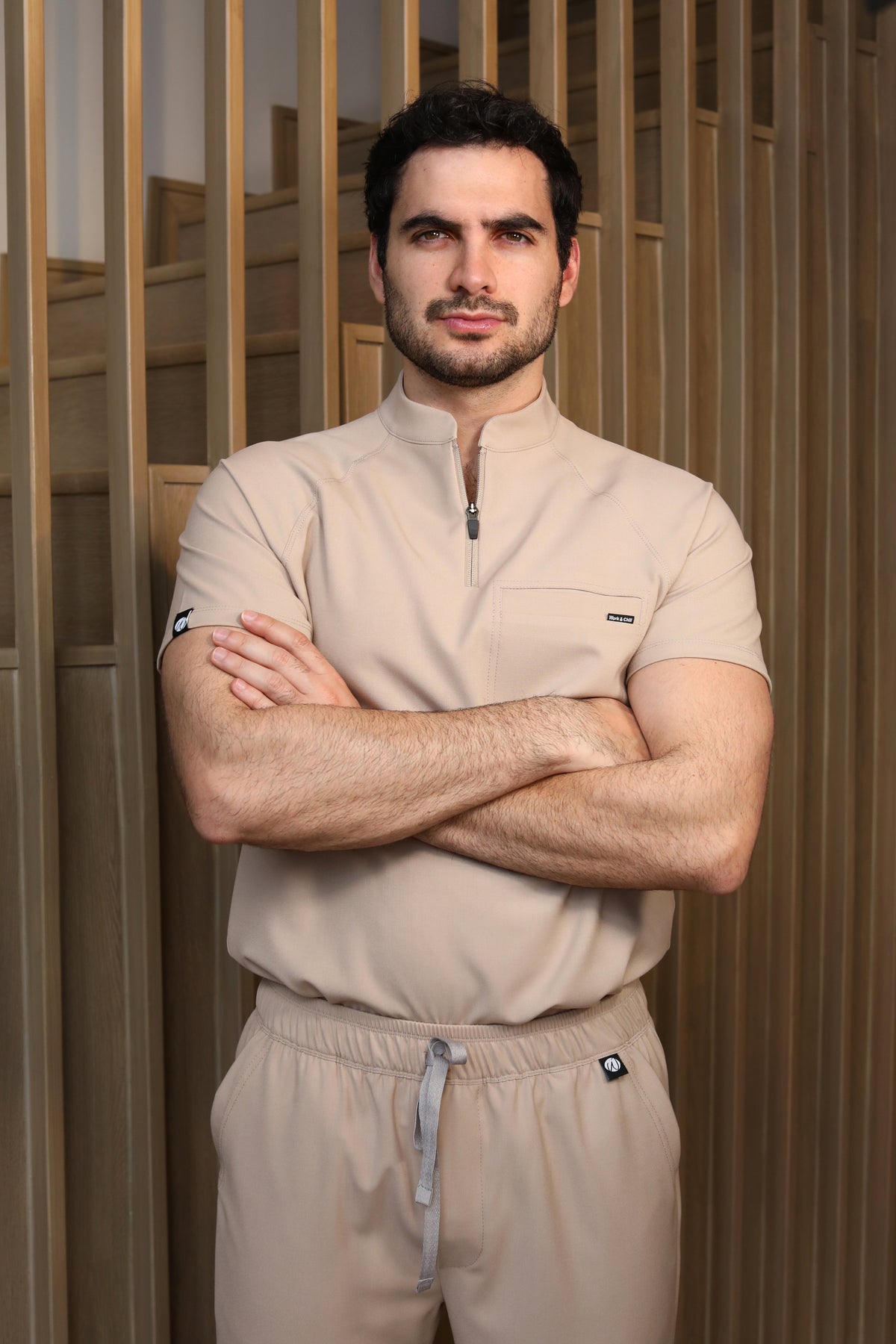 Man wearing Harry Natural Scrub Top by Work & Chill