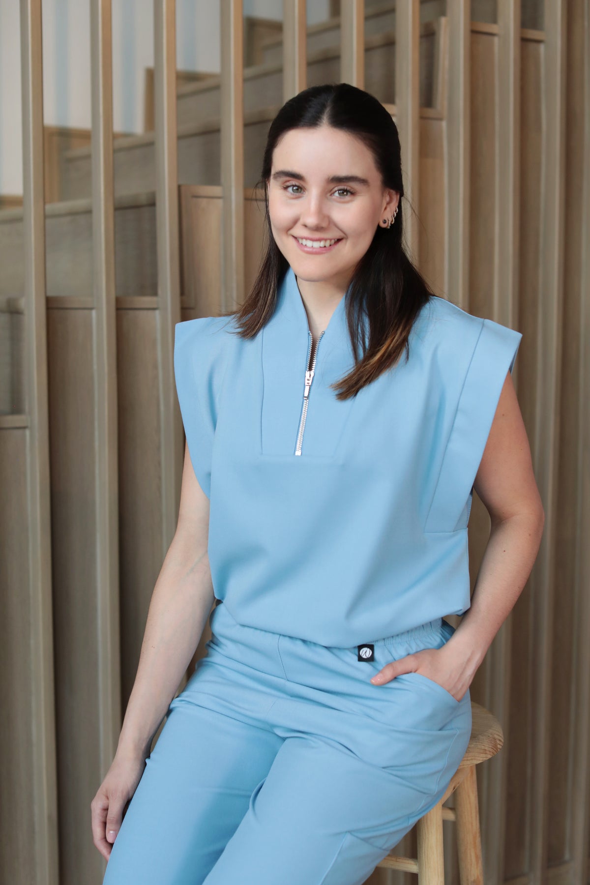 Kate Dream Blue Scrub Top styled with matching scrub pants